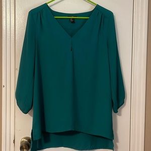 Green long sleeved blouse perfect for work